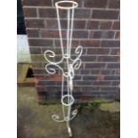 A painted wrought iron garden climbing column of scrolled form. (50in)