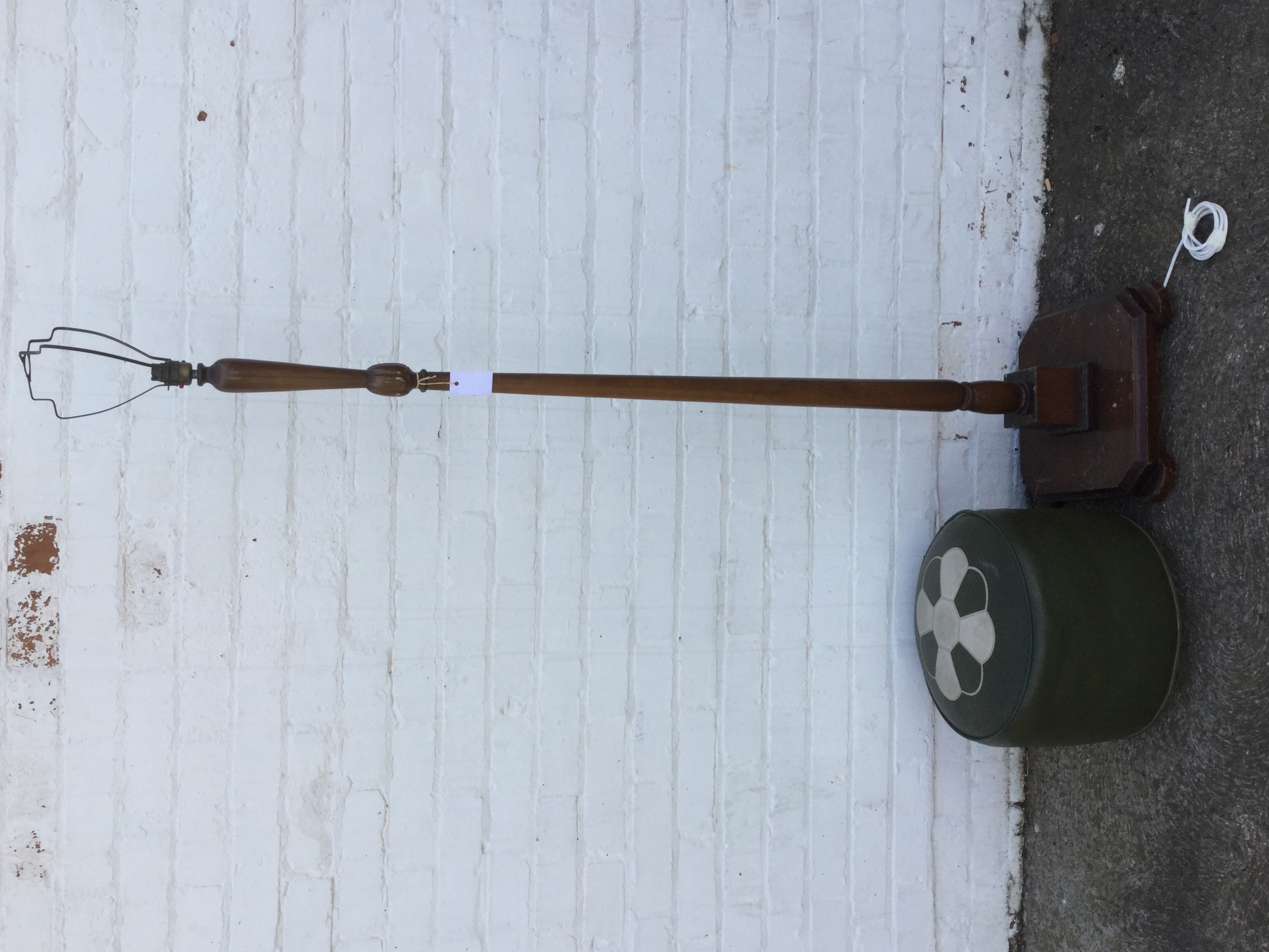 A standard lamp, the tapering column with fluted carved bud