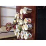 A mug tree with a collection of mugs