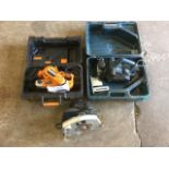 A cased Worx electric belt sander; a Powerbase circular rip saw; and a boxed Bosch electric wood