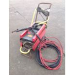 A Reno 90 240V pressure washer with lance, hose, filter, etc.