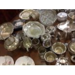 A quantity of pewter and silver plate including part teasets,