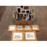 A box of empty, mainly new, unused frames & mirrors; and a set of six pine framed prints of thatched