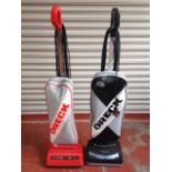 A Oreck XL Xtended life bag vacuum cleaner with hypo-allergernic filter system; and another similar