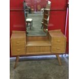 A 60s walnut dressing table