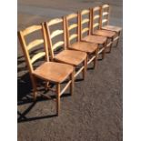 A set of six elm ladderback chairs