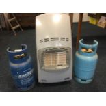 A Delonghi Quatrro plus portable gas heater on casters, with three gas cylinders. (4)