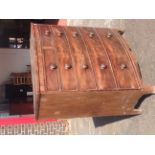 A nineteenth century mahogany bowfronted chest of drawers, having two short and four long graduated