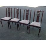 A set of four mahogany dining chairs