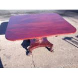 A nineteenth century mahogany breakfast table