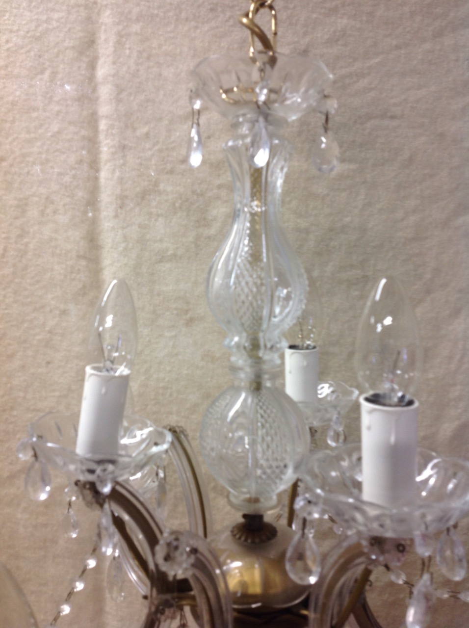 A glass chandelier with five branches around a fluted column, hung with glass drops and bead swags. - Image 2 of 3