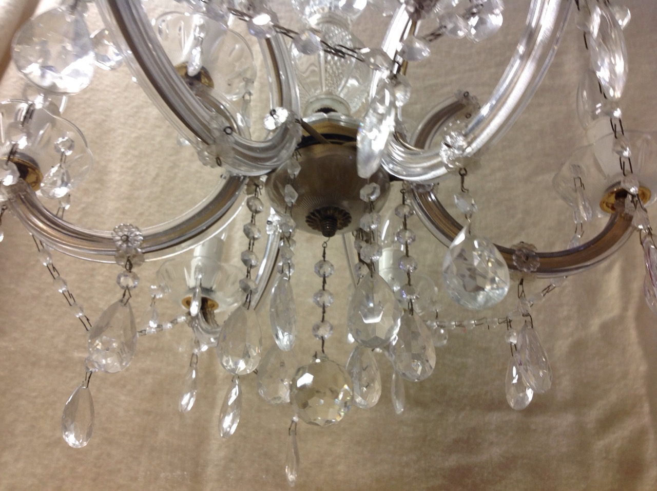 A glass chandelier with eight scrolled branches, hung with festoon crystal drops - Image 3 of 3