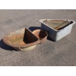 A galavanised corner trough; a cast iron corner trough with curved moulded rim; and a circular cast