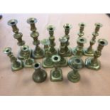 Four pairs of Victorian brass candlesticks; and seven others of similar design. (15)