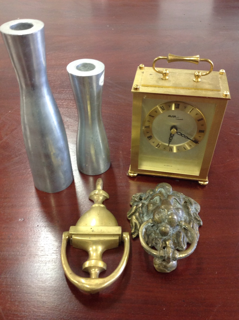 Two brass door knockers; a reproduction quartz carriage clock; and a graduated pair of steel candle - Image 3 of 3