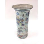 A nineteenth century tubular stickstand with flared rim, decorated in polychrome with oriental symb