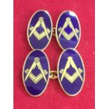 A pair of 9 carat gold enamelled cufflinks, the heavily cast pair with masonic symbols