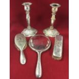 A European silver plated three-piece ladies dressing table set with hand mirror, hair brush