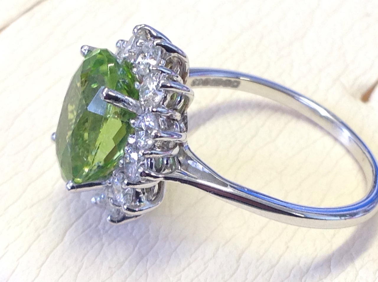 An 18ct diamond and peridot cluster ring, the large green oval stone of over four carats - Image 3 of 3