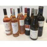 A selection of rose wine including a 2011 Bordeaux, a 2012 Pinot Grigio Blush, two bottles of French