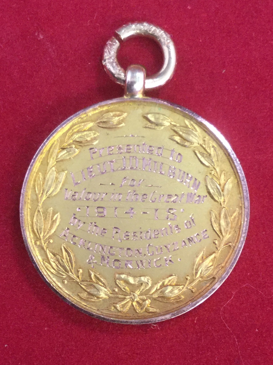A gold medal awarded to Lt JD Milburn by the residents of Acklington, Guyzance & Morwick for valour
