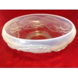 A Lalique style glass bowl, moulded with opalescent lilies, raised on circular foot. (11in)