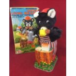 A boxed battery powered coffee- loving bear by Rosko, the tinplate Japanese toy with plush fur body.