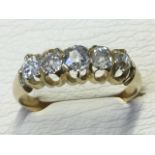 A Victorian 18 carat gold five stone diamond ring, the stones of approx .75 carats.