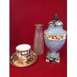 A Wedgwood urn & cover decorated in the Freya pattern with floral and fruit bands