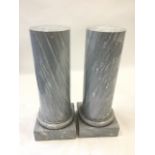 A pair of Victorian grey marble columns, with moulded bases on square plinths. (12.5in x 32.5in)