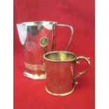 A hallmarked silver tankard with ribbed decoration raised on moulded foot - Sheffield, 1944;