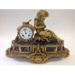 A French ormolu mantle clock, the convex enamelled dial marked Paris with blue roman chapters,