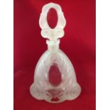 An acid etched glass decanter & stopper, moulded with oval polished facets framed by leaves