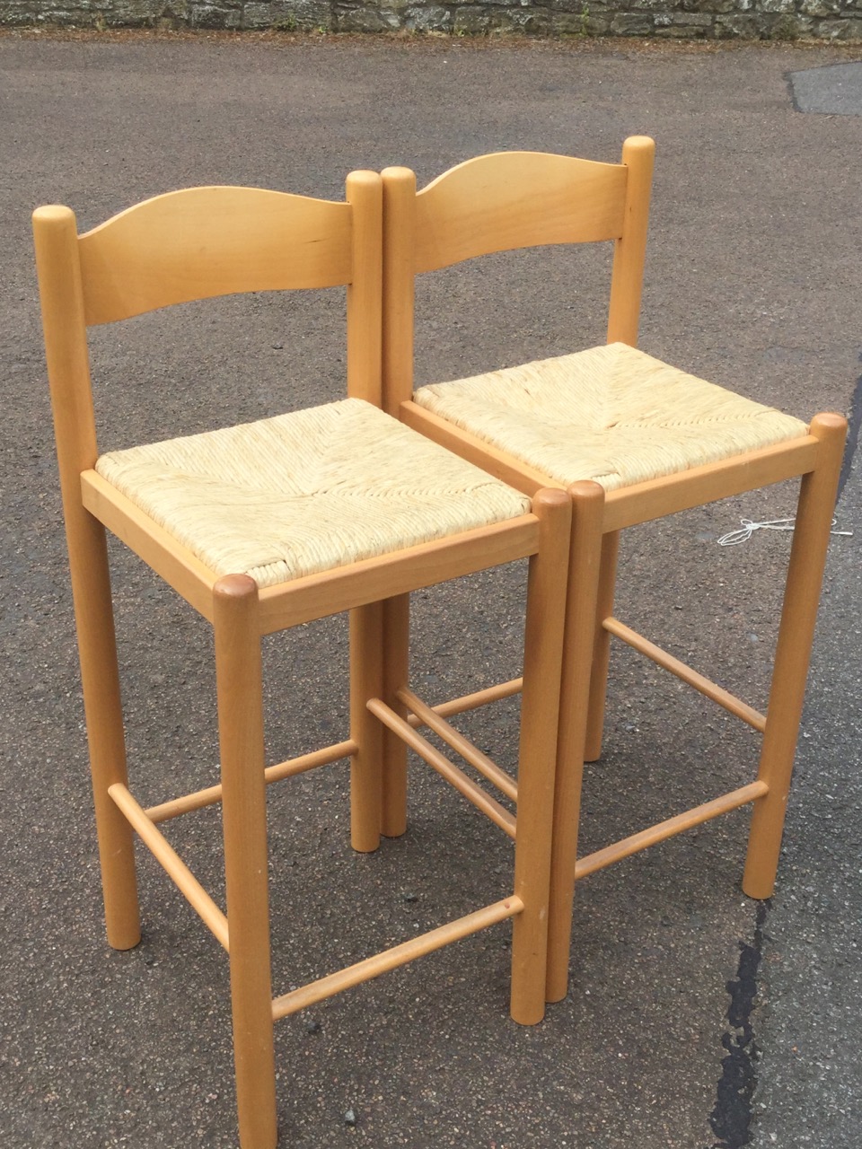 A pair of beech kitchen bar stools with rush seats on column supports; and a kitsch pink upholstered - Image 3 of 3