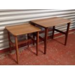 A graduated pair of Schreiber 70s coffee tables, with rounded teak style tops on conforming