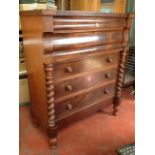 A Victorian mahogany scotch chest, with two long cushion moulded frieze drawers above three