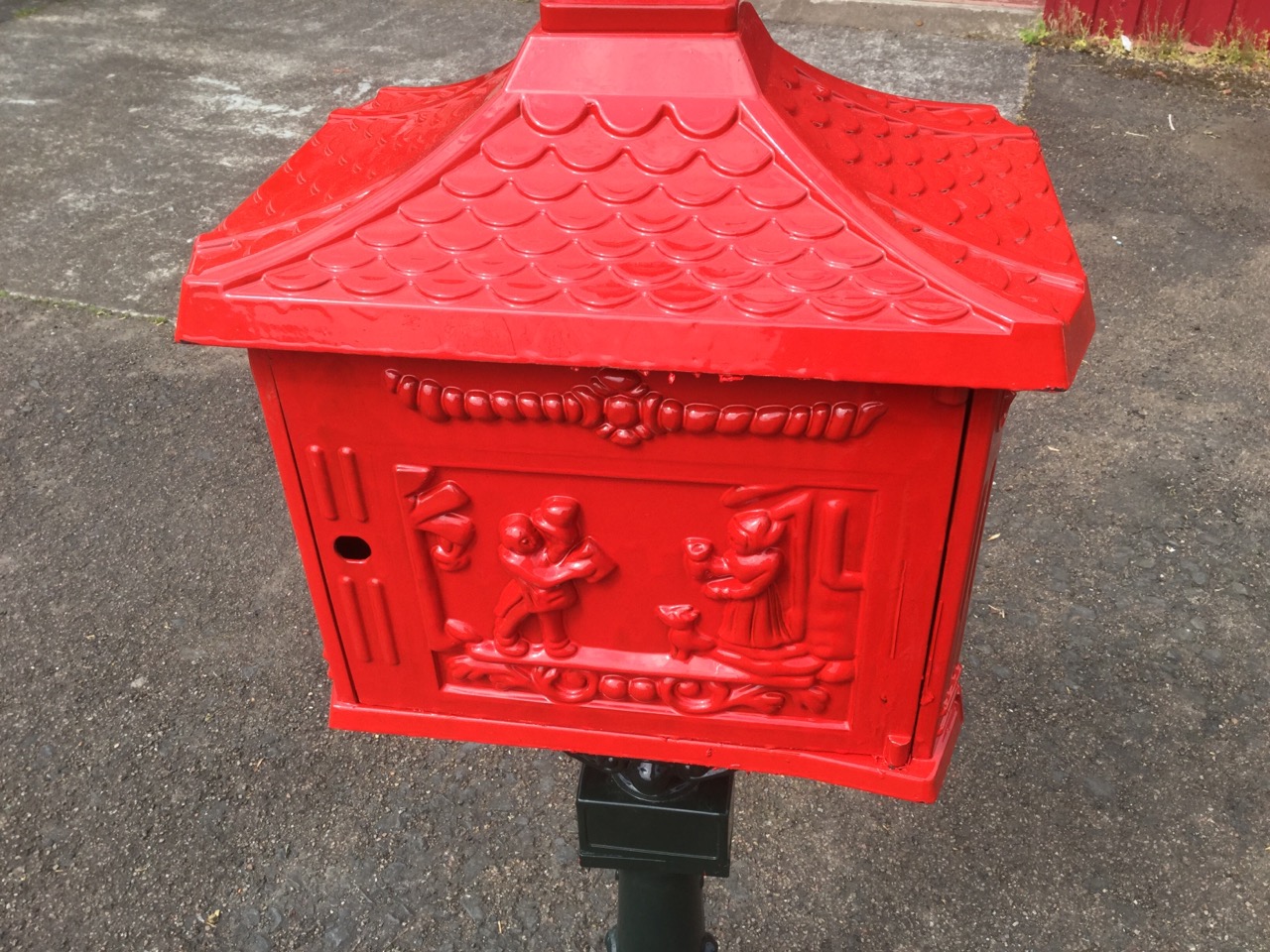 A metal postbox, the container with letterbox embossed with postboy & horn panels beneath a - Image 3 of 3