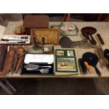 Miscellaneous collectors items including ebony brushes & mirror, a boxed set of game place mats, a