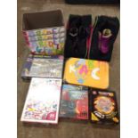 Two cased pairs of SFR roller blades, sizes 3 & 5; and various childrens games, jigsaws, trays &