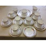 A Paragon teaset decorated in the Belinda pattern with cups & saucers, sandwich plate, sucrié,
