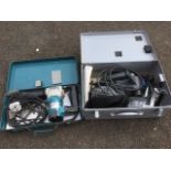 A cased Elu electric planer, complete with instructions, attachments, etc; and a boxed Makita