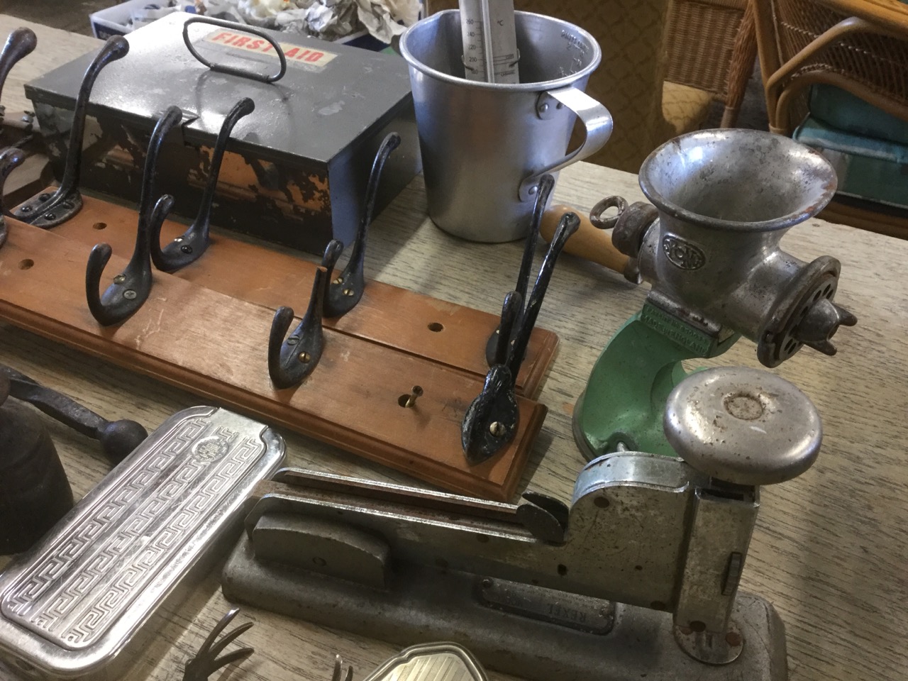 A box of miscellaneous items including rows of pegs, a mincer, four brass Salter scales, a spoon - Image 2 of 3