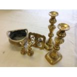 A pair of Victorian brass candlesticks; a Chinese brass spittoon; a pair of miniature