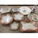 A Victorian Burslem part dinner service with ashets, plates, tureens, etc; a large circular Wedgwood