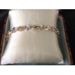 An 18ct gold sapphire & diamond bracelet