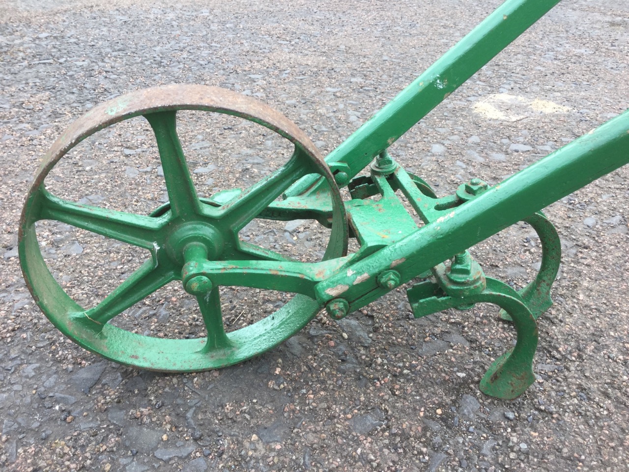 A hand harrow, with three shaped plough blades and cast iron wheel. - Image 2 of 3