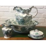 A Victorian Staffordshire wash set set decorated with green flowers with gilded rims - jug, basin,