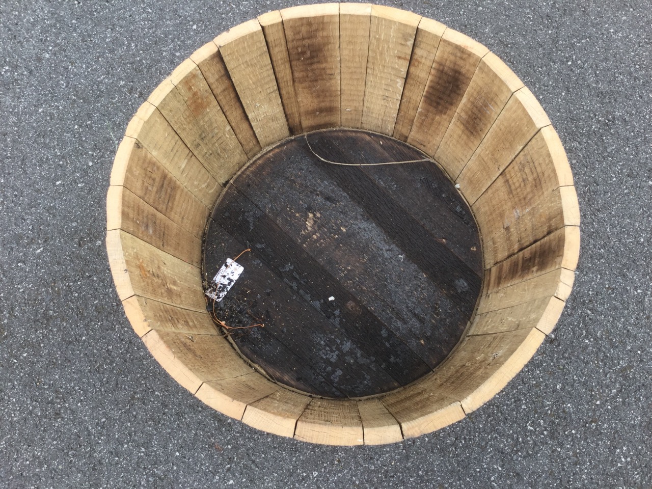 An oak barrel planter, the tub with three metal bands binding staves. - Image 3 of 3