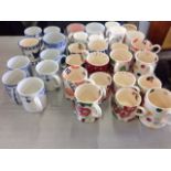 A collection of 15 Emma Bridgwater mugs; and other mugs including blue & white, Spode, Masons,