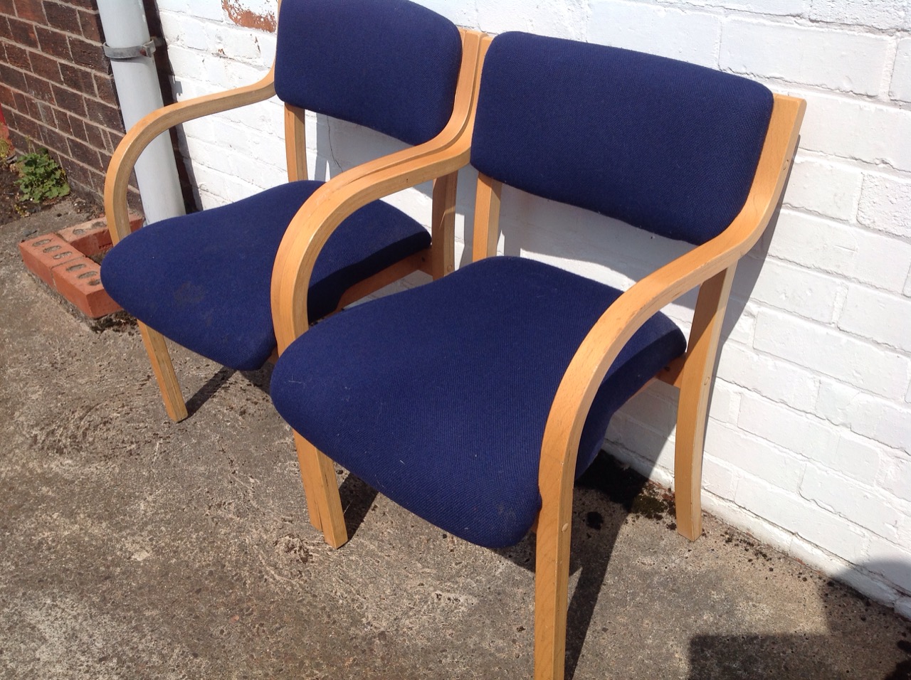 A pair of contemporary beech armchairs, with padded upholstered backs and downswept arms framing - Image 2 of 3